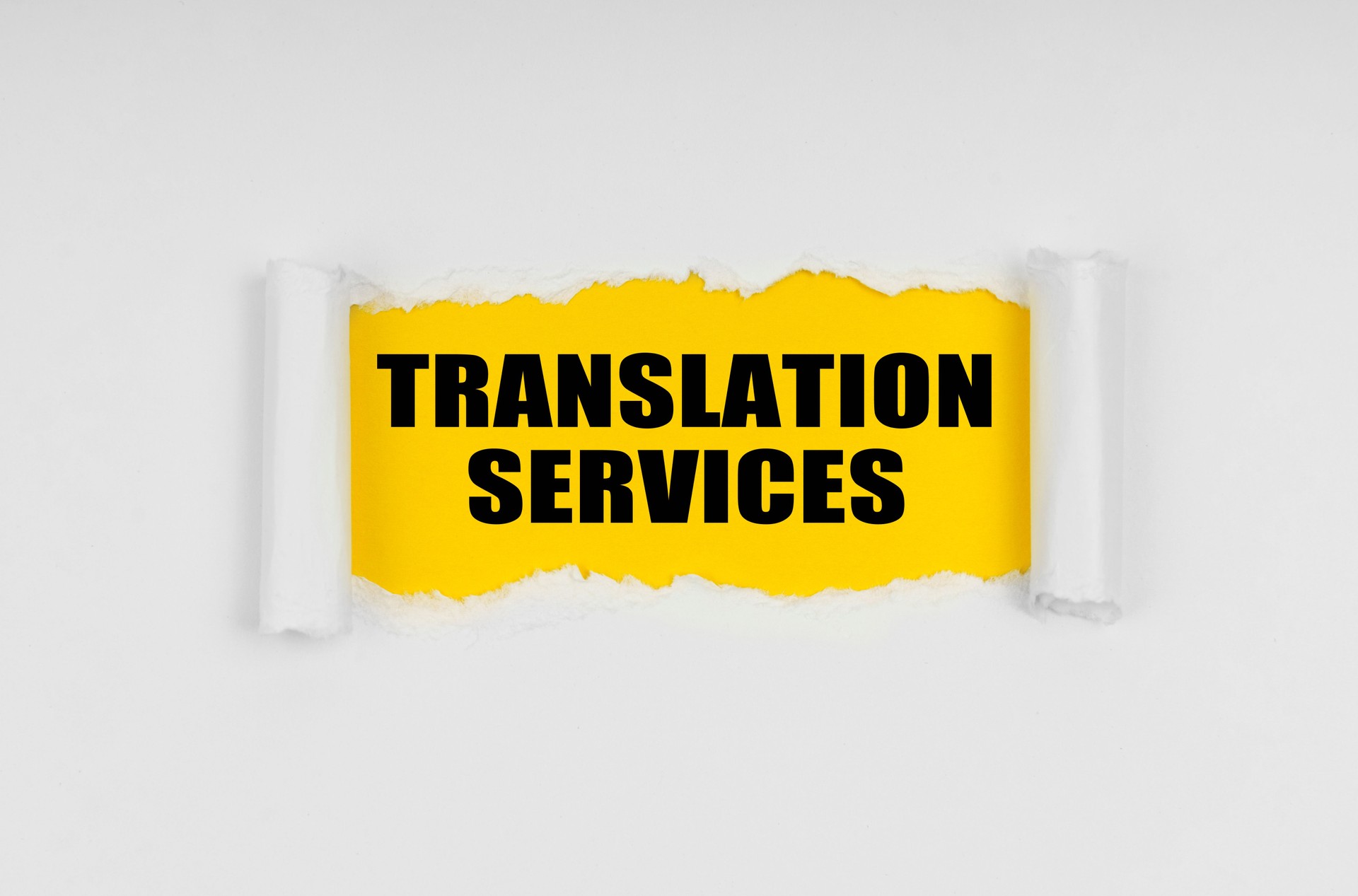A window is made in the paper, where on a yellow background the inscription - Translation Services